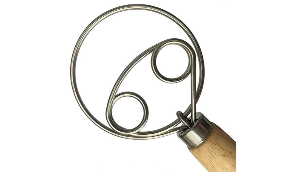 small wooden handled whisk