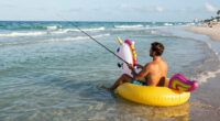 TIL a man in a unicorn pool floaty was fishing near the beach in Fort Lauderdale when he hooked a 10-foot shark that proceeded to drag him four miles offshore in his floaty. He was eventually rescued by the crew of a larger fishing vessel who were baffled at the situation when they happened upon him